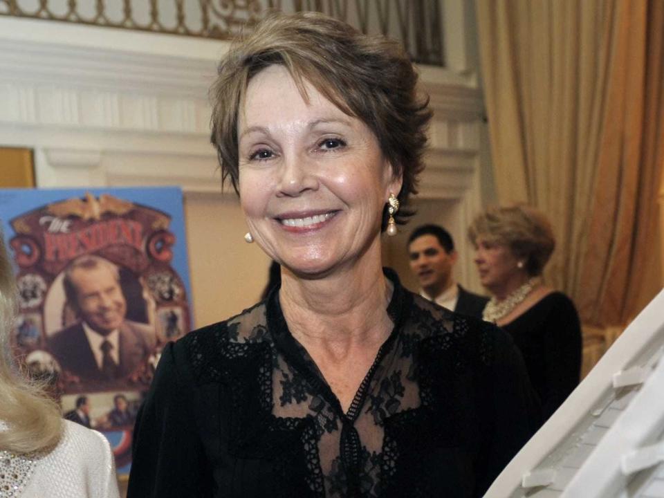 Julie Nixon Eisenhower smiles at the camera