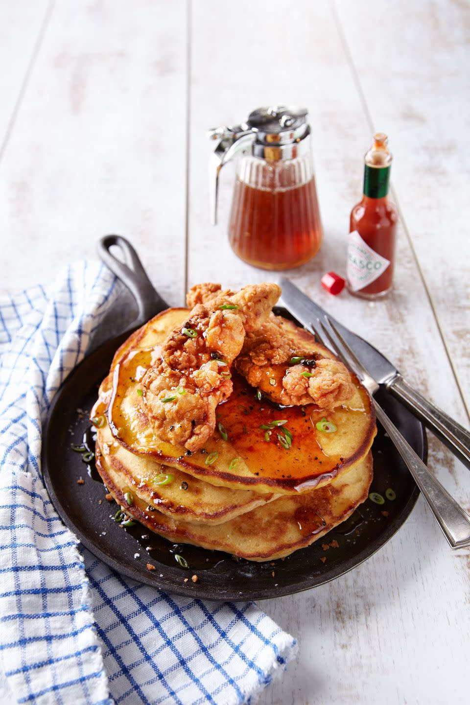 chicken and corn bread pancakes with spicy syrup