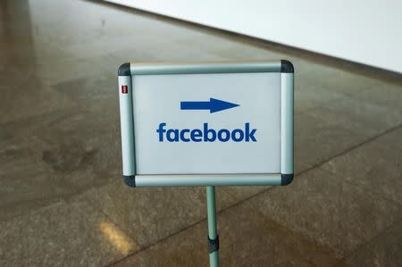 A picture shows the Facebook logo at the Facebook office in Berlin, Germany, August 29, 2016. REUTERS/Stefanie Loos