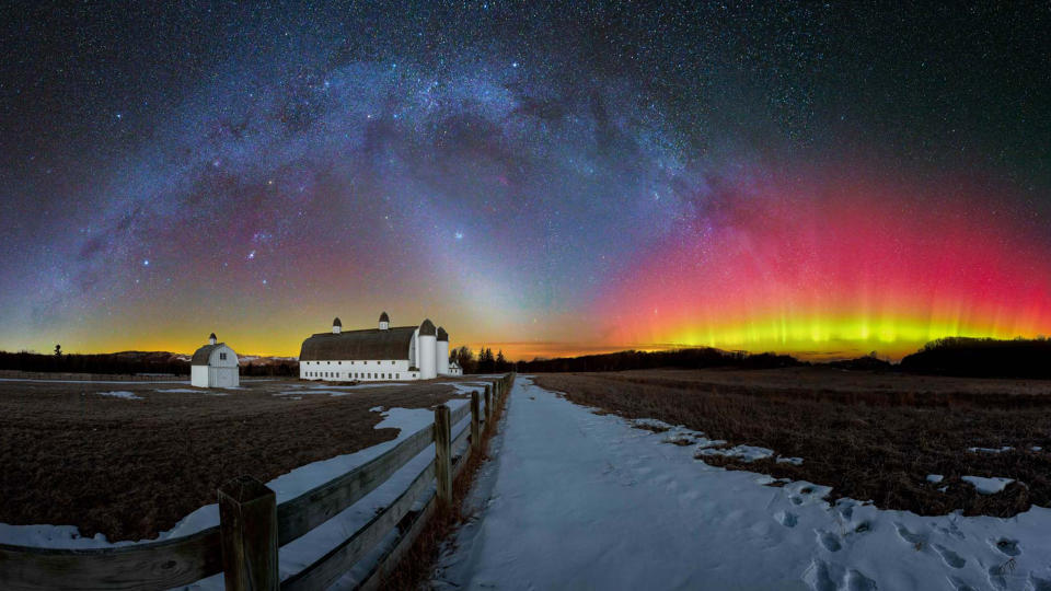 Purple, red and yellow northern lights over Glen Arbor, Michigan.