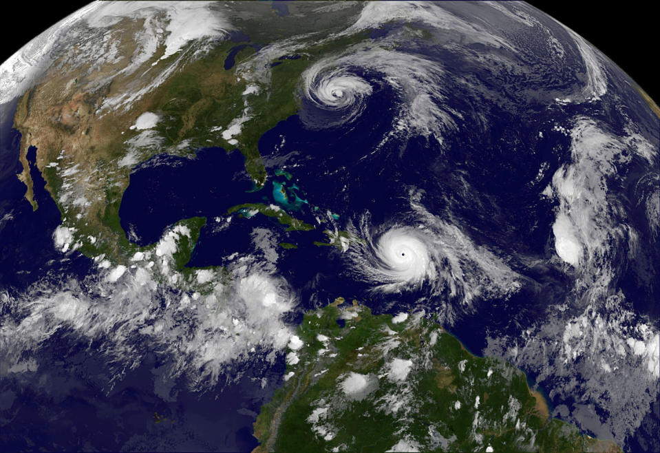 <p>Hurricane Maria which bore down menacingly on the Virgin Islands and Puerto Rico on Tuesday after devastating the tiny island nation of Dominica and Hurricane Jose (top) are both seen in the Atlantic Ocean in this NOAA’s GOES East satellite image taken at 21:45 p.m. EDT on September 19, 2017 (0145 UTC, September 20, 2017). (Photo: NASA/NOAA GOES via Reuters) </p>
