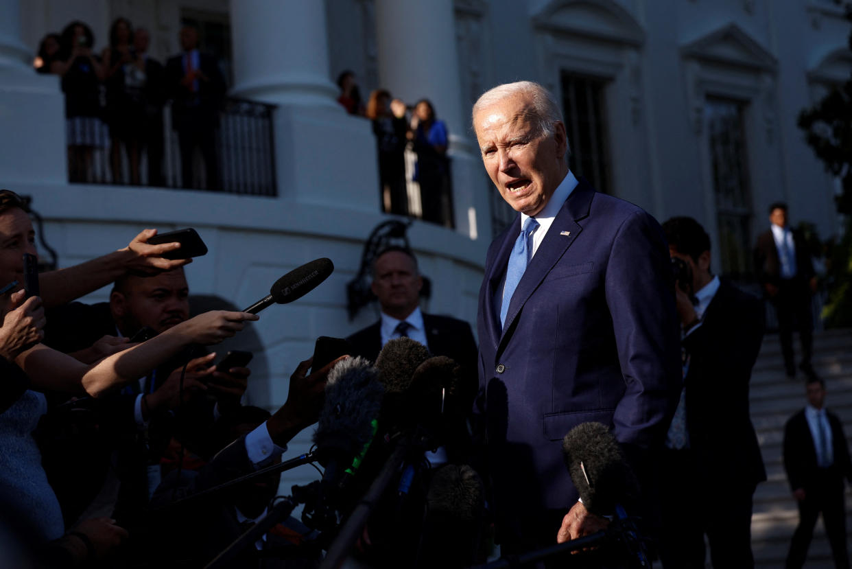 U.S. President Joe Biden speaks to the media before departing the White House for Camp David, in Washington, U.S., May 26, 2023. REUTERS/Evelyn Hockstein