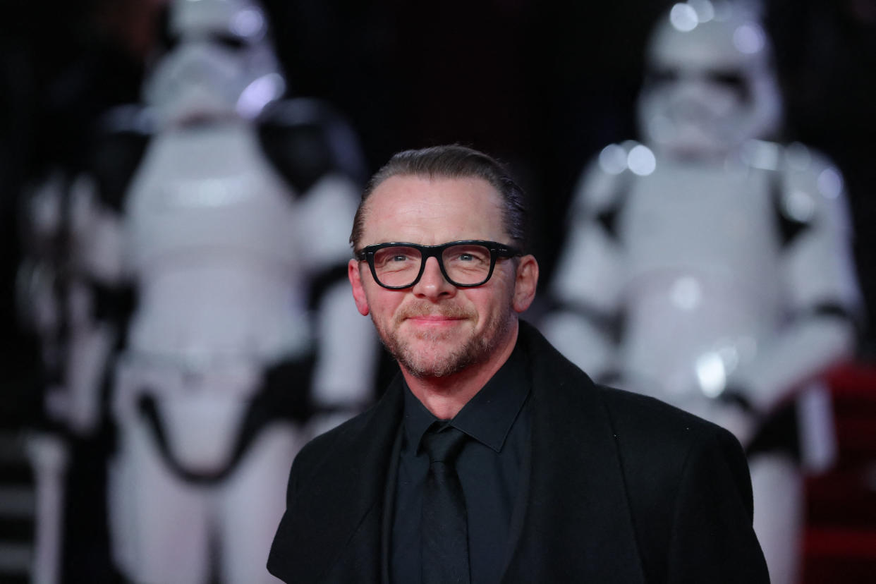 British actor Simon Pegg poses on the red carpet for the European Premiere of Star Wars: The Last Jedi at the Royal Albert Hall in London on December 12, 2017. (Photo by Daniel LEAL / AFP) (Photo by DANIEL LEAL/AFP via Getty Images)