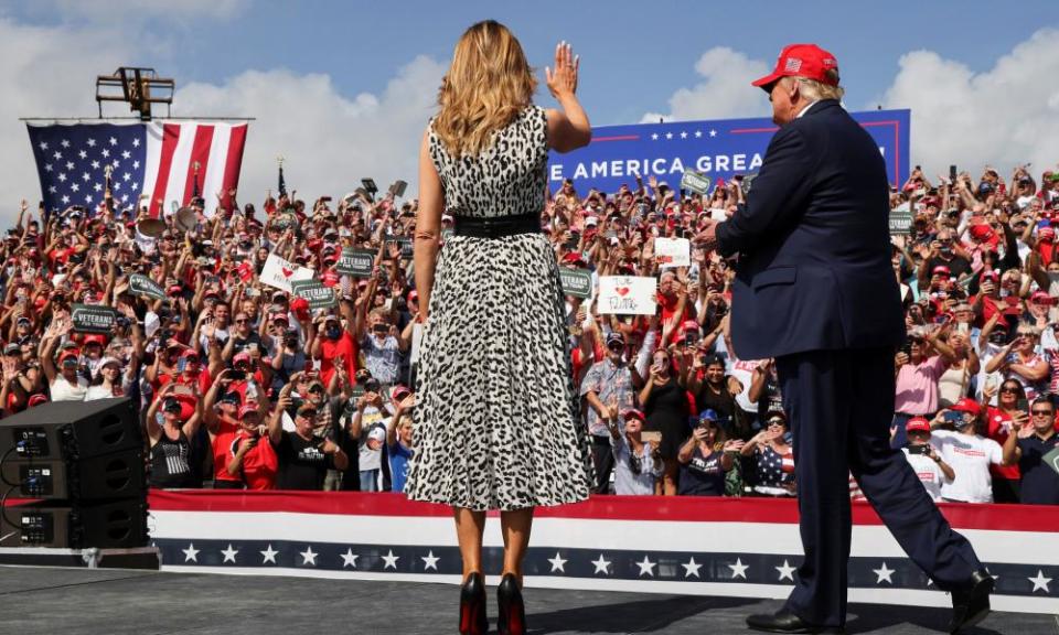 Melania Trump joins her husband Donald at his campaign rally outside Raymond James Stadium, in Tampa, Florida, on Thursday.