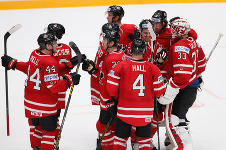 Ice Hockey - 2016 IIHF World Championship - Group B - St. Petersburg, Russia - 6/5/16 - Canada players celebrate victory over U.S. REUTERS/Maxim Zmeyev