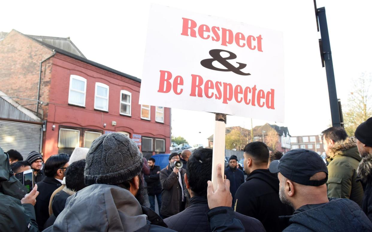 Parents and children demonstrate outside the Parkfield Community School in the Saltley area of Birmingham - Caters News Agency