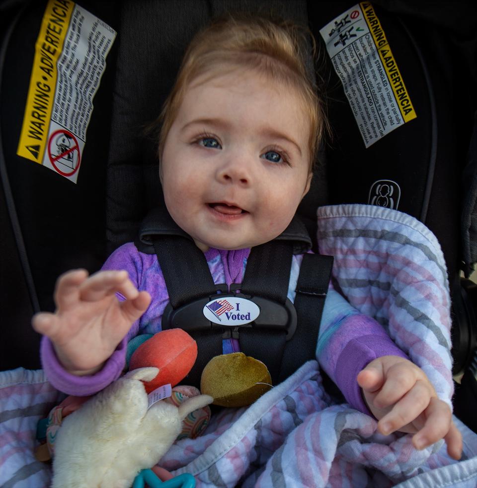 At Bensalem High School, Abigail Rauchet, 6 months, wears an 'I Voted' sticker after her grandmother, Jan Robold, voted during the primary election in Bucks County, on Tuesday, May 16, 2023.
