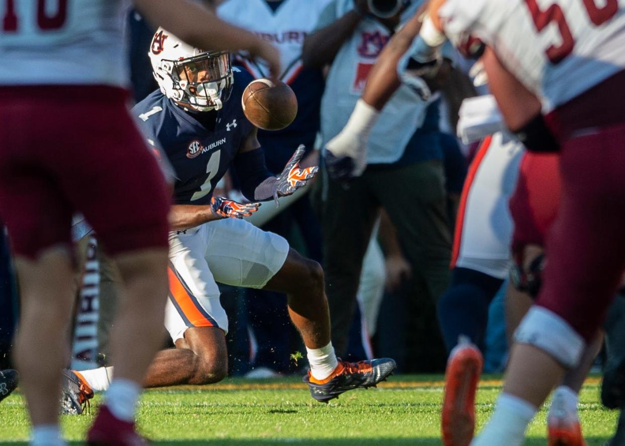 Auburn Tigers defensive back Nehemiah Pritchett (1) intercepts a pass as Auburn Tigers take on New Mexico State Aggies at Jordan-Hare Stadium in Auburn, Ala., on Saturday, Nov. 18, 2023. New Mexico State Aggies leads Auburn Tigers 10-7 at halftime.