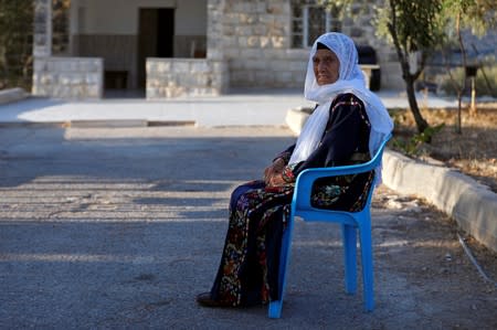 Muftia, the grandmother of U.S. congresswoman Rashida Tlaib, looks on as she sits outside her house in the village of Beit Ur Al-Fauqa in the Israeli-occupied West Bank