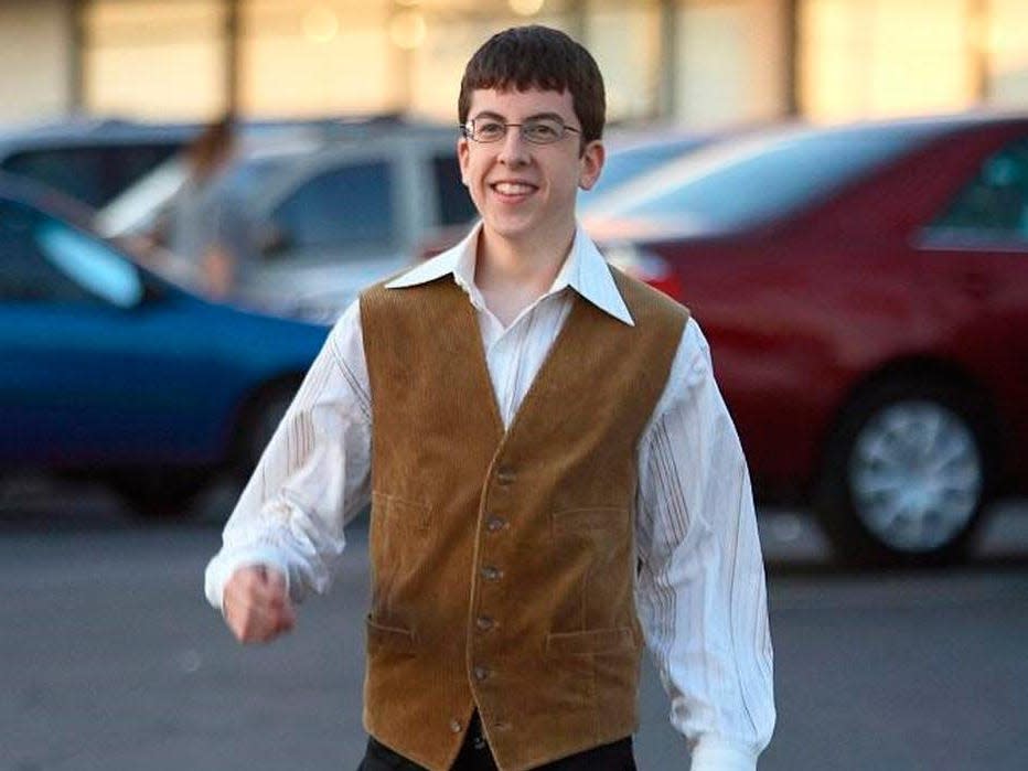 Christopher Mintz-Plasse wears a collared shirt and leather vest in "Superbad."