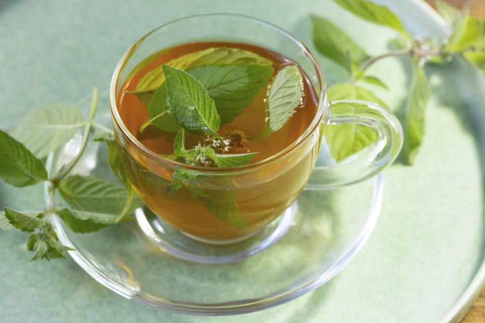 clear mug of peppermint tea