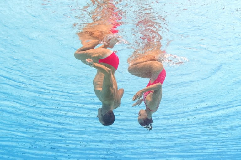 Christina Jones and Bill May compete in the Mixed Duet Technical final during the synchronised swimming competition at the 2015 FINA World Championships in Kazan on July 26, 2015