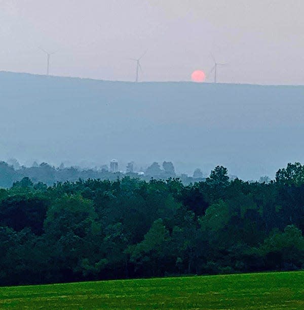 Western Wayne Little League games have been postponed due to the poor air quality caused by Canadian wildfires. Shown here is the sun nearly blotted out by haze. The photo was taken near Waymart looking out toward the wind turbines on Farview Mountain.
