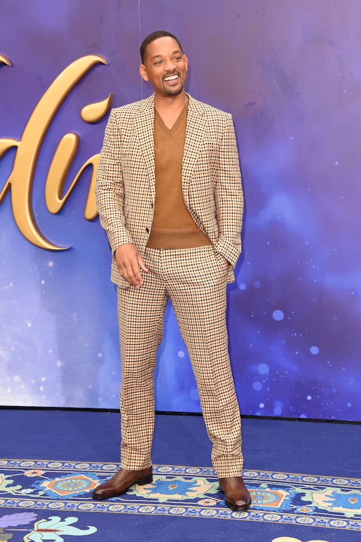 On May 9, Will Smith walked the magic carpet in a slick checked suit teamed with a co-ordinating knit - the perfect rain-proof ensemble. [Photo: Getty]