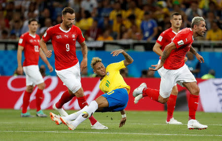 Soccer Football - World Cup - Group E - Brazil vs Switzerland - Rostov Arena, Rostov-on-Don, Russia - June 17, 2018 Switzerland's Valon Behrami in action with Brazil's Neymar REUTERS/Damir Sagolj