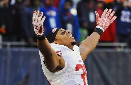 FILE PHOTO: Dec 6, 2015; Chicago, IL, USA; San Francisco 49ers free safety Eric Reid (35) reacts after beating the Chicago Bears 26-20 in overtime at Soldier Field. Mandatory Credit: Matt Marton-USA TODAY Sports / Reuters Picture Supplied by Action Images/File Photo (TAGS: Sport American Football NFL) *** Local Caption *** 2015-12-06T220828Z_1354034694_NOCID_RTRMADP_3_NFL-SAN-FRANCISCO-49ERS-AT-CHICAGO-BEARS.JPG