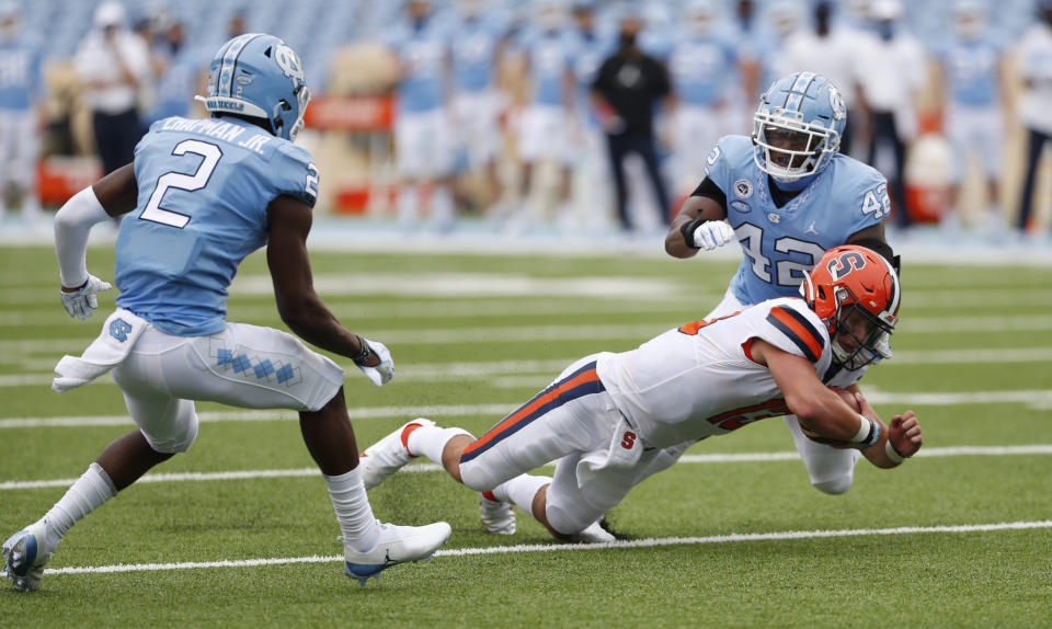 Syracuse quarterback Tommy DeVito (13) dives for extra yardage in the first half of an NCAA college football game in Chapel Hill, N.C. Saturday, Sept. 13, 2020. (Robert Willett/The News & Observer via AP, Pool)