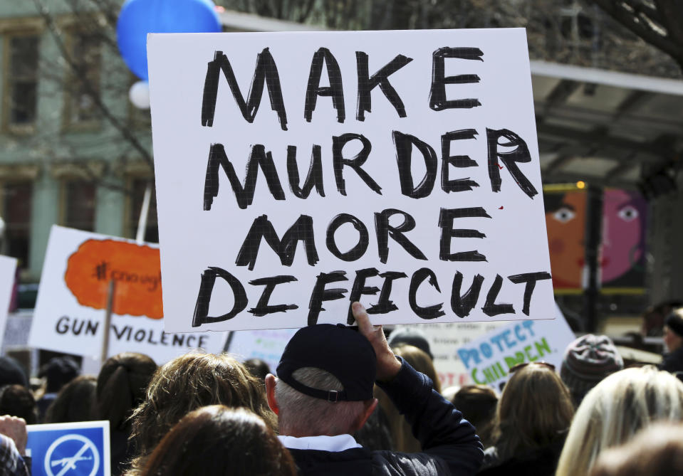 <p>A person holds a sign during a Gun Control Rally in Market Square in downtown Pittsburgh, PA. (AP Photo/Gene J. Puskar) </p>