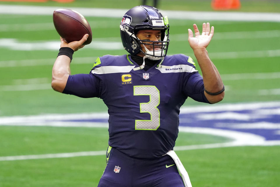 Seattle Seahawks quarterback Russell Wilson (3) warms up prior to an NFL football game against the San Francisco 49ers, Sunday, Jan. 3, 2021, in Glendale, Ariz. (AP Photo/Rick Scuteri)