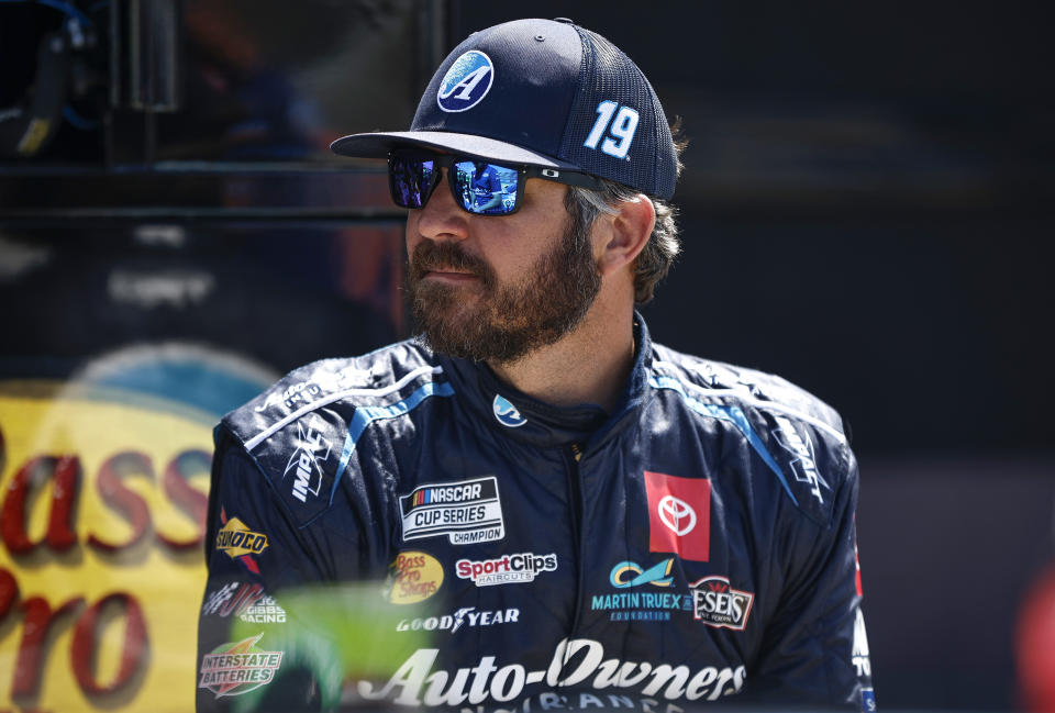 BROOKLYN, MICHIGAN - AUGUST 06: Martin Truex Jr., driver of the #19 Auto-Owners Insurance Toyota, waits on the grid during practice for the NASCAR Cup Series FireKeepers Casino 400 at Michigan International Speedway on August 06, 2022 in Brooklyn, Michigan. (Photo by Sean Gardner/Getty Images)