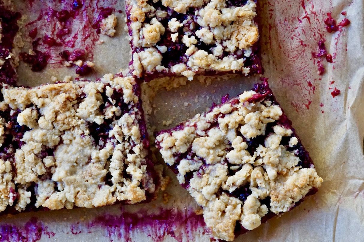 Red berry and oat crumble squares.