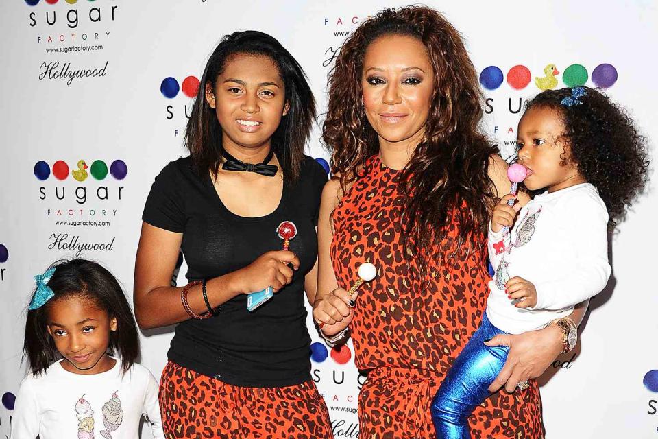 <p>Jason LaVeris/FilmMagic</p> Mel B and her daughters Angel Iris Murphy Brown, Phoenix Brown and Madison Brown Belafonte attend the grand opening of Sugar Factory Hollywood on November 13, 2013 in Hollywood, California.