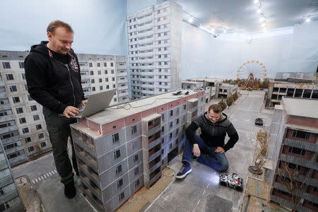 Co-founders of the 'Isotopium: Chernobyl' game Sergey Beskrestnov and Alexey Fateyev attend an interview with Reuters at the game's location in Brovary, Ukraine April 25, 2019. REUTERS/Valentyn Ogirenko