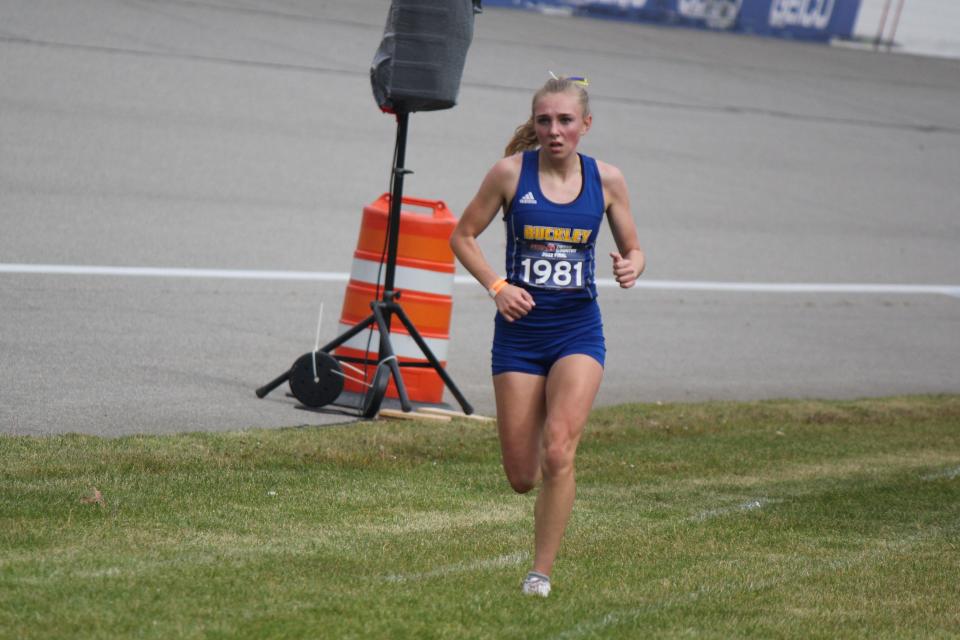 Buckley junior Aiden Harrand has the finish stretch all to herself. Harrand won the MHSAA Division 4 girls’ cross-country race at Michigan International Speedway in 19:05.89, 15 seconds better than Auburn Hills Oakland Christian’s Eliza Keith.