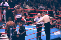 <p>Evander Holyfield has his right ear checked by after he was bit in the ear by Mike Tyson in the third round of their WBA Heavyweight match Saturday, June 28, 1997, at the MGM Grand in Las Vegas. </p>