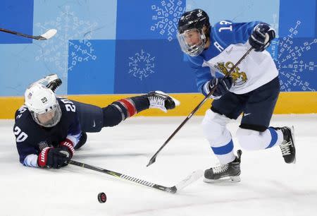 Ice Hockey - Pyeongchang 2018 Winter Olympics - Women's Semifinal Match - U.S. v Finland- Gangneung Hockey Centre, Gangneung, South Korea - February 19, 2018 - Hannah Brandt of the U.S. in action with Riikka Valila of Finland. REUTERS/Grigory Dukor