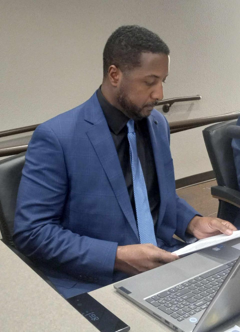 Ward 4 Carlsbad City Councilor Anthony Foreman looks over the agenda from the Jan. 9, 2024 Carlsbad City Council meeting. He is starting his first term on council.