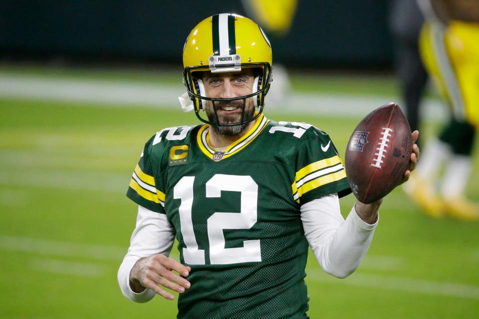 Aaron Rodgers warms up before a Chicago-Green Bay game in November 2020. The Pack went on to win its second consecutive NFC North divisional title, with a 13-3 record.