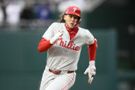 Philadelphia Phillies' Alec Bohm runs toward third base on his triple during the second inning of a baseball game against the Washington Nationals, Saturday, April 6, 2024, in Washington. (AP Photo/Nick Wass)