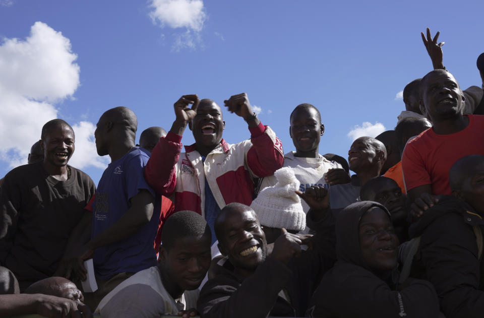 Prisoners celebrate after being released from Chikurubi Maximum prison on the outskirts of the capital Harare, Thursday, April 18, 2024. Zimbabwe President Emmerson Mnangagwa has granted amnesty to more than 4,000 prisoners in an independence day amnesty. The amnesty coincided with the country's 44th anniversary of independence from white minority rule on Thursday and included some prisoners who were on death row. (AP Photo/Tsvangirayi Mukwazhi)