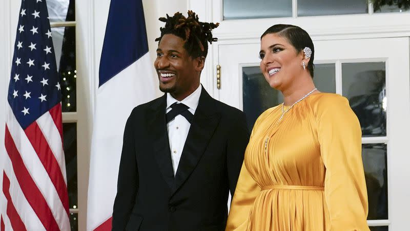 Musician Jon Batiste arrives with his wife Suleika Jaouad for the State Dinner with President Joe Biden and French President Emmanuel Macron at the White House in Washington on Dec. 1, 2022.