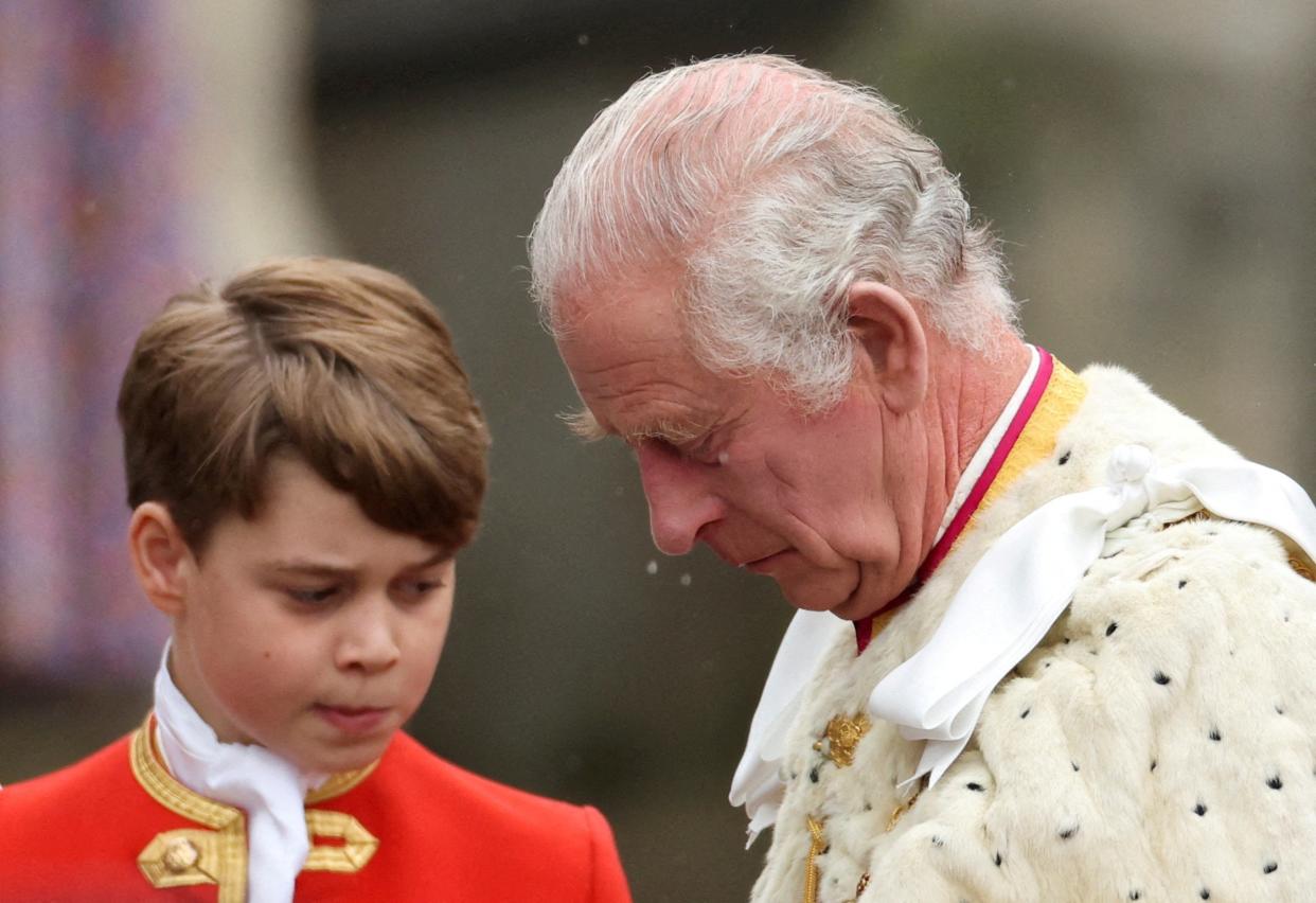 Prince George with grandfather King Charles III yesterday (Reuters)