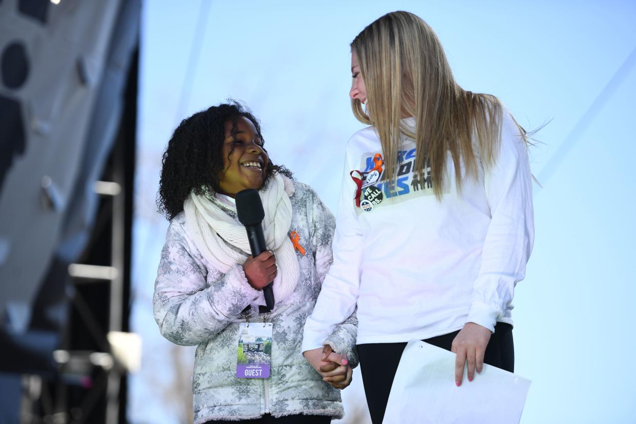 Martin Luther King Jr’s granddaughter, Yolanda Renee King, speaks next to Marjory Stoneman Douglas High School student Jaclyn Corin during the March for Our Lives Rally in Washington, D.C., on March 24, 2018. (Photo: Jim Watson/AFP/Getty Images)