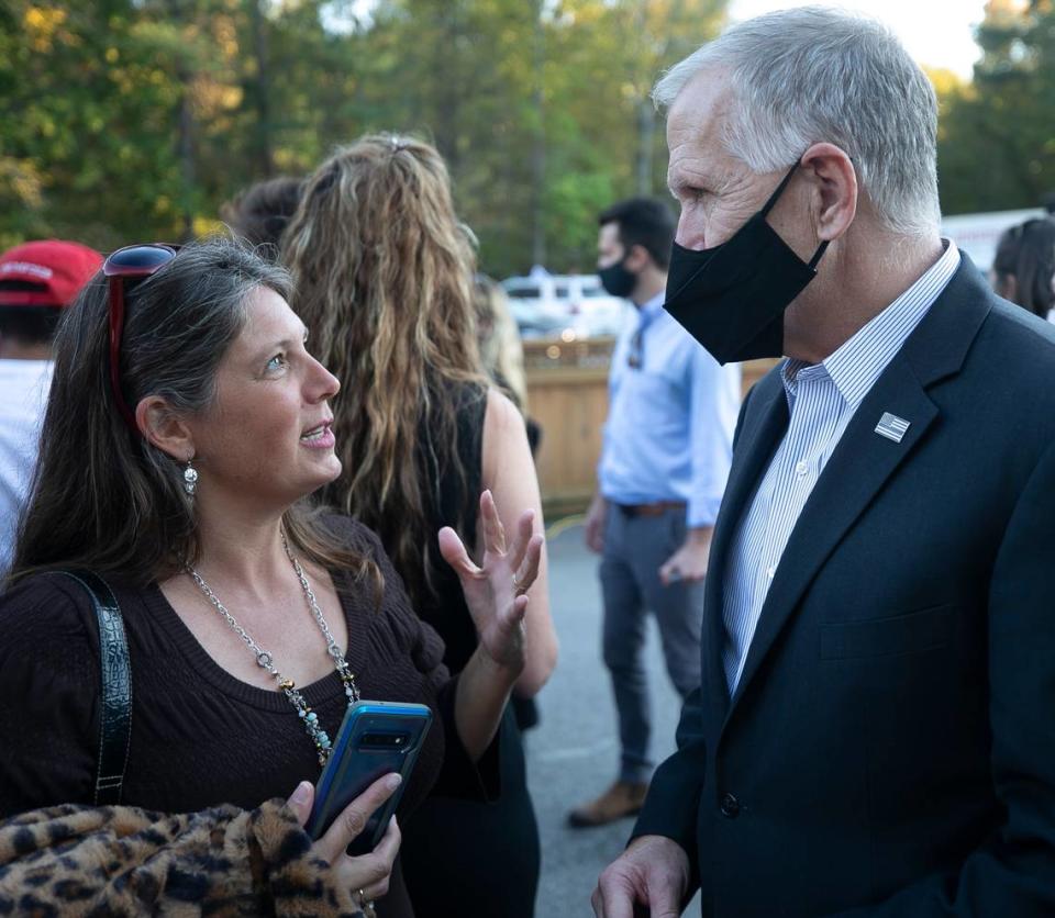 Michele Morrow talks with Sen.Thom Tillis during a campaign stop at the Angus Barn in Raleigh on Friday, October, 30, 2020.