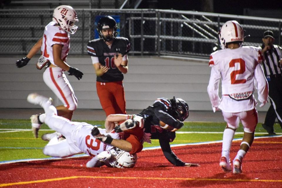 Durfee's KJ Strong scores a rushing touchdown in Friday's game against Barnstable