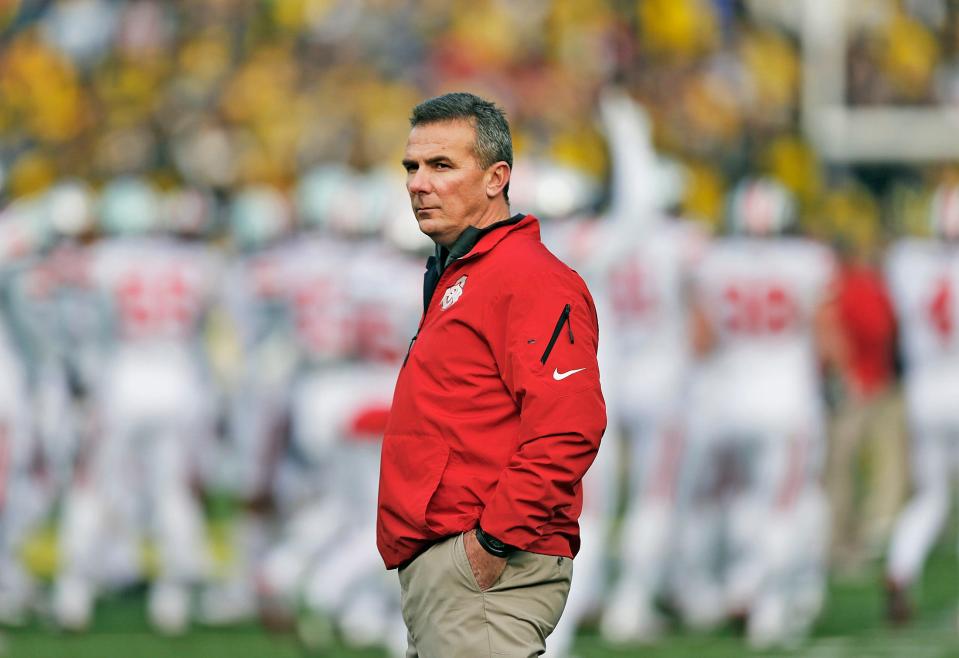 Ohio State coach Urban Meyer, shown here at the 2013 Michigan game in which Marcus Hall was ejected, regrets suspending Hall. “I take partial responsibility,” Meyer said, “because we had them lathered up ready to go.”