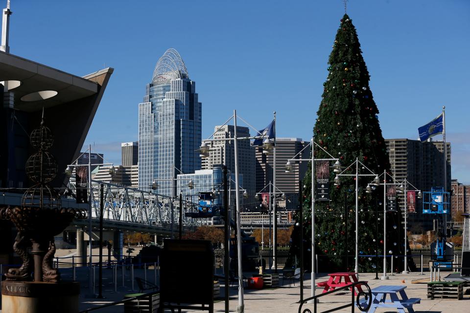 Holiday decorations are installed ahead of cold weather at Newport at the Levee at in Newport, Ky., on Monday, Nov. 9, 2020.