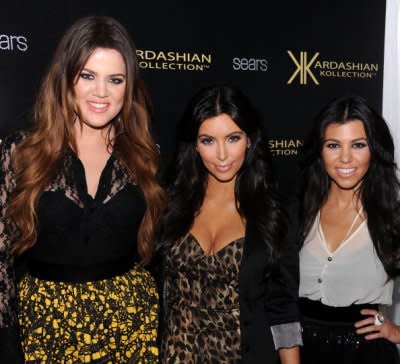 The Kardashians sisters say their dad got them hooked up makeup as teens. Photo by Getty Images