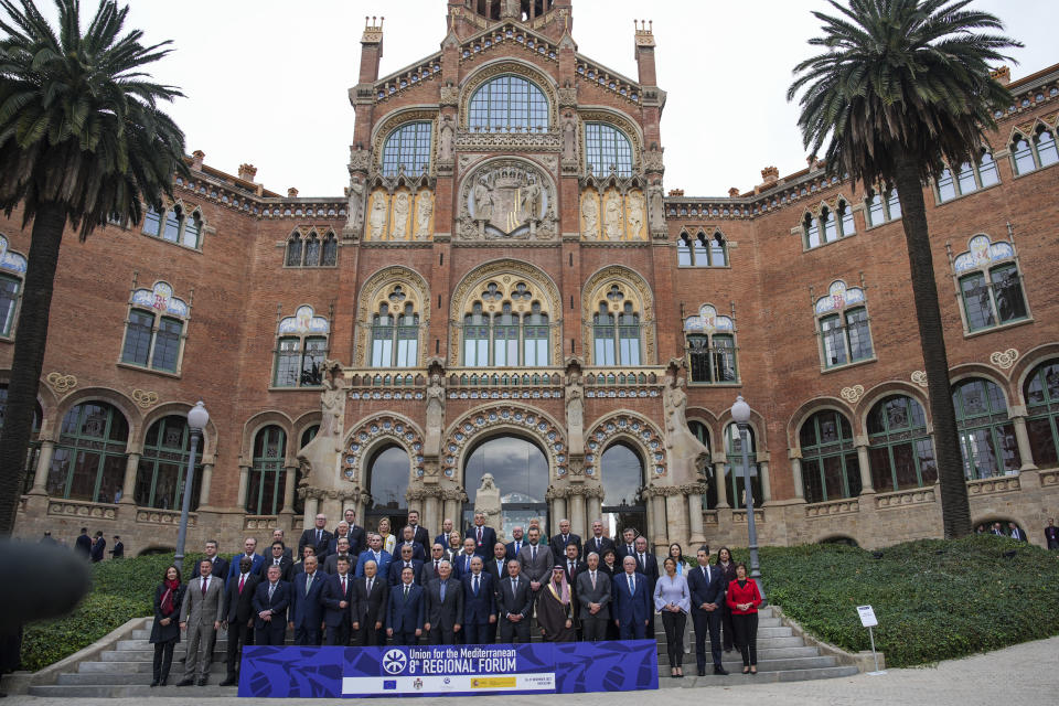 European Union foreign policy chief Josep Borrell, front row and ninth from left, poses with foreign ministers and delegation members of European Union member states, Middle East and northern Africa countries during a family picture at the Union for the Mediterranean event in Barcelona, Spain, Monday, Nov. 27, 2023. (AP Photo/Emilio Morenatti)