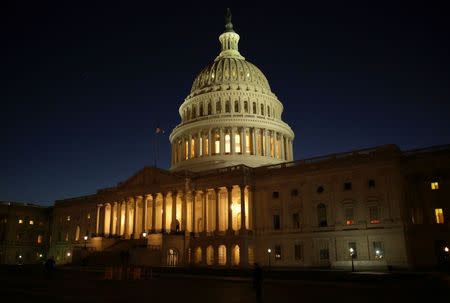 The U.S. Capitol Building is lit at sunset in Washington, U.S., December 20, 2016. REUTERS/Joshua Roberts