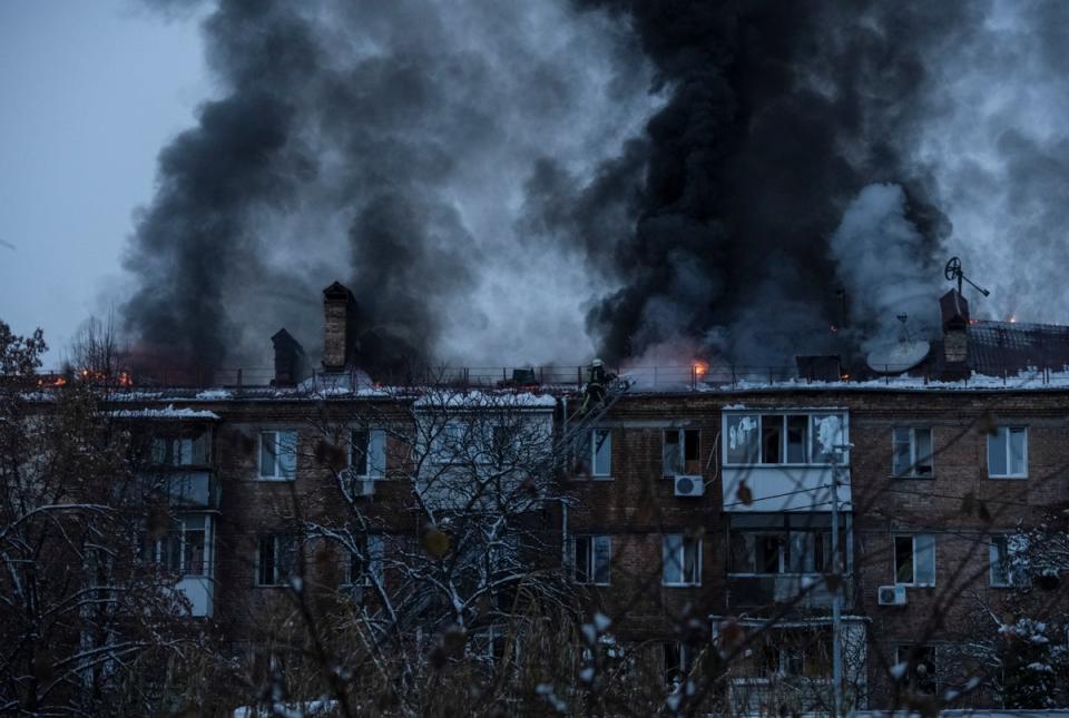 Fire rages at the site of a strike in Vyshgorod (Reuters)