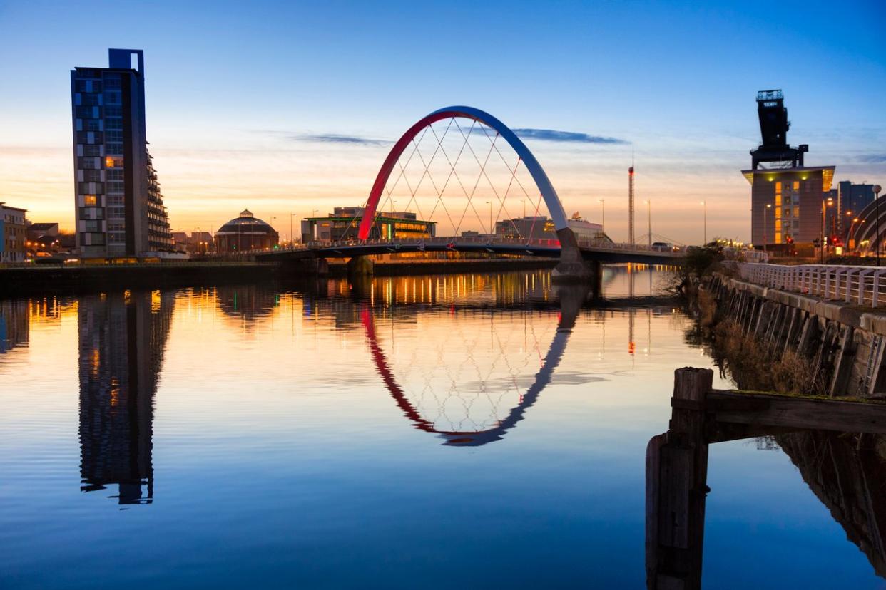 Evening view along the River Clyde from the city towards the Finnieston Bridge, with Pacific Quay and the Glasgow Science Centre tower beyond: Getty/iStock