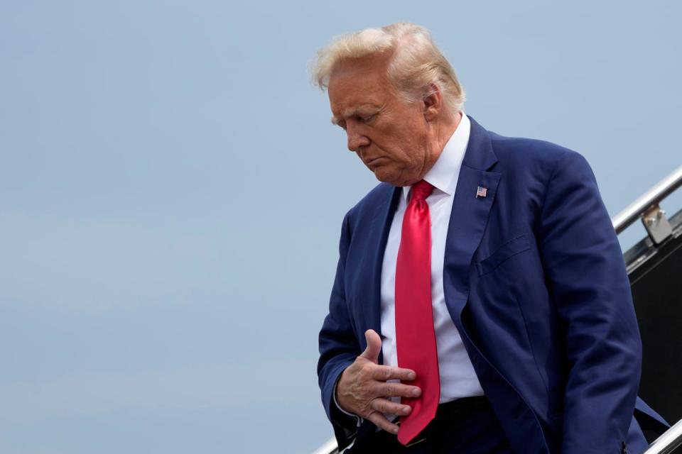 Former President Donald Trump arrives at Ronald Reagan Washington National Airport for his 3 August arraignment (Copyright 2023 The Associated Press. All rights reserved.)