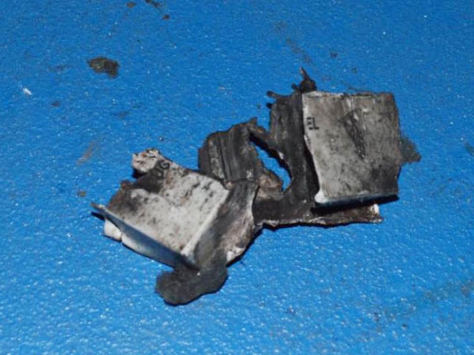 A 12-volt battery that was the possible power source for the bomb