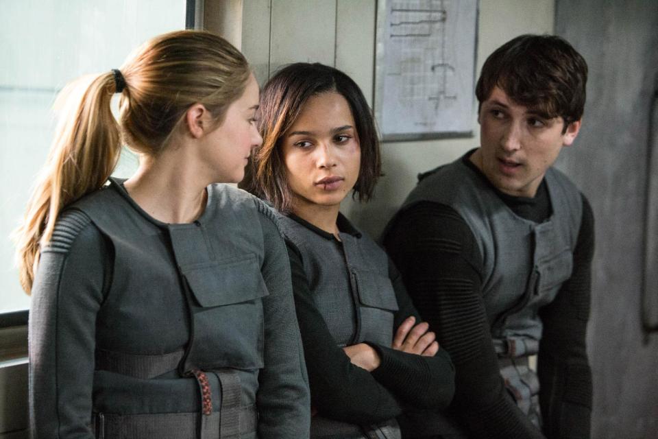 This photo released by Summit Entertainment, LLC shows, from left, Shailene Woodley as Beatrice "Tris" Prior, Zoe Kravitz, as Christina and Ben Lloyd-Hughes as Will in the film, "Divergent." (AP Photo/Summit Entertainment, Jaap Buitendijk)