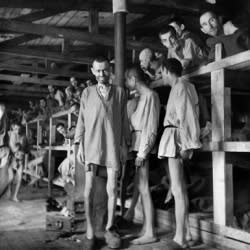 <b>Prisoners at Buchenwald concentration camp in Germany in April 1945, just after the army of Gen. George S. Patton liberated the camp.</b> Eric Schwab/AFP/<a class="link " href="http://www.gettyimages.com" rel="nofollow noopener" target="_blank" data-ylk="slk:Getty Images;elm:context_link;itc:0;sec:content-canvas">Getty Images</a>